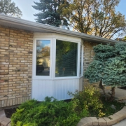 A replacement bay window custom-made and installed on a Winnipeg house by Hi-Tech.