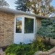 A replacement bay window custom-made and installed on a Winnipeg house by Hi-Tech.