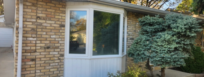 A replacement bay window custom-made and installed on a Winnipeg house by Hi-Tech.